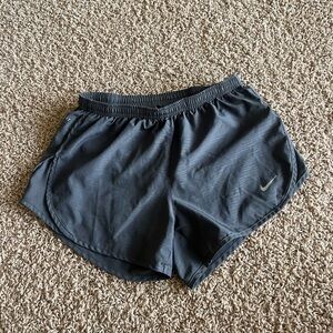 gray nike running shorts. size x-small